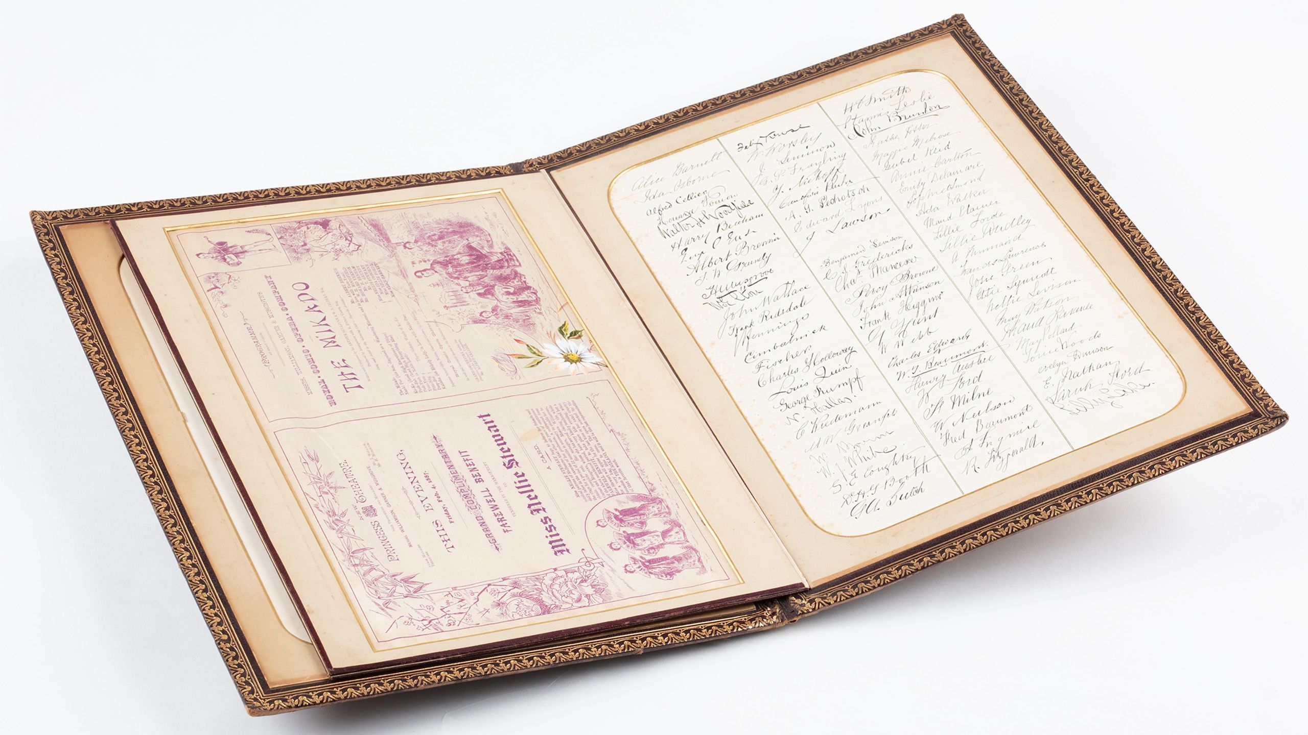 Open pages of book bound in brown leather, with theatre program on one page and a list of signatures on the other