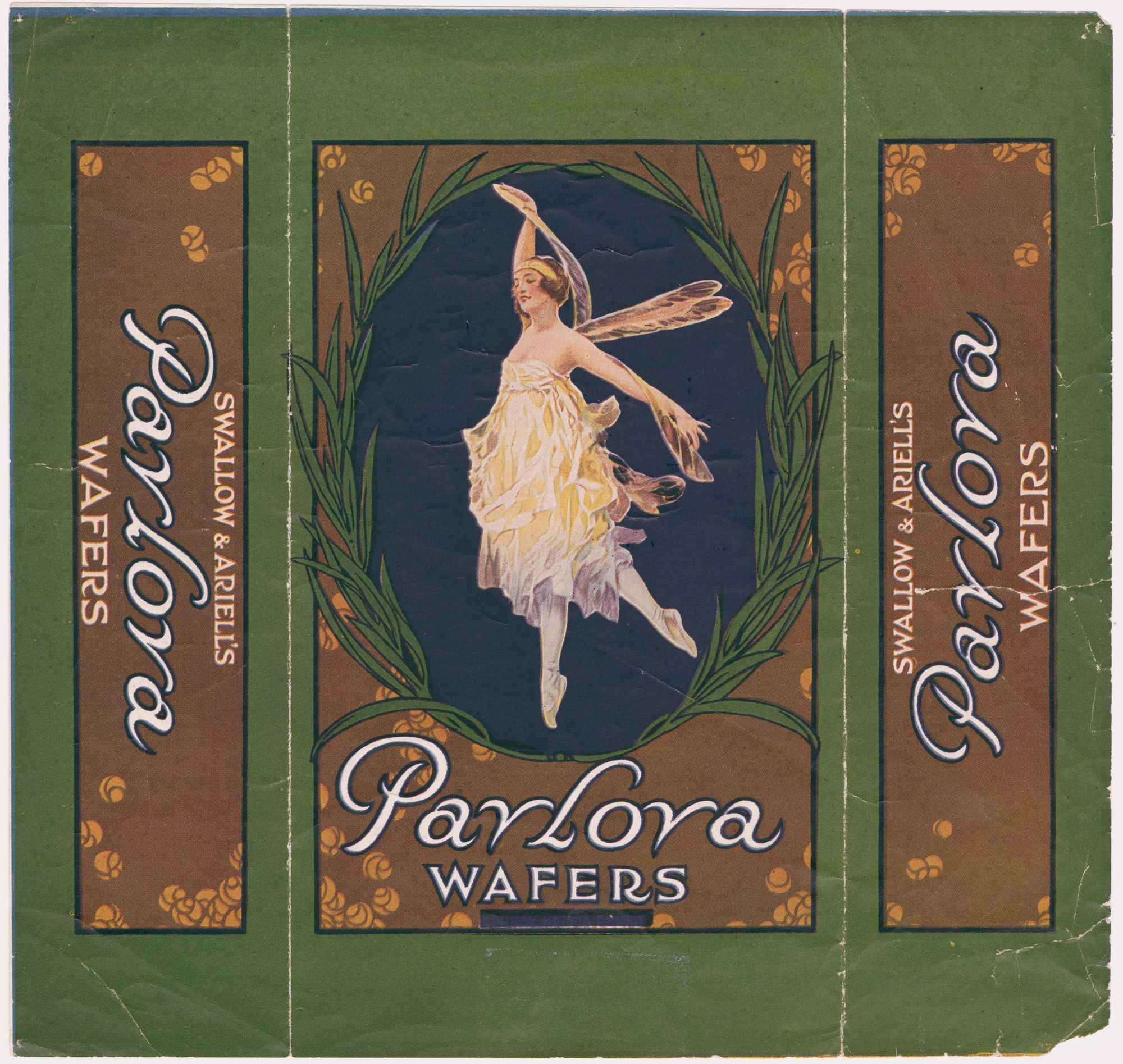 Flattened wrapper for wafer chocolates. Brown, green and blue with illustration of ballet dancer in the middle. She is wearing a cream flowy costume with wings, and her feet are stretched out at hip distance as though shes leaping through the air. Her left arm is reaching above her head holding onto her left wing, and her right arm is stretched out diagonally down on the right. She is looking towards the left. She is framed in an oval frame with ullustrations of green leaves on either side. "Swallow & Ariell's Pavlova Wafers" are printed on either side of the image of the dancer, "Pavlova Wafers" printed below the image. 