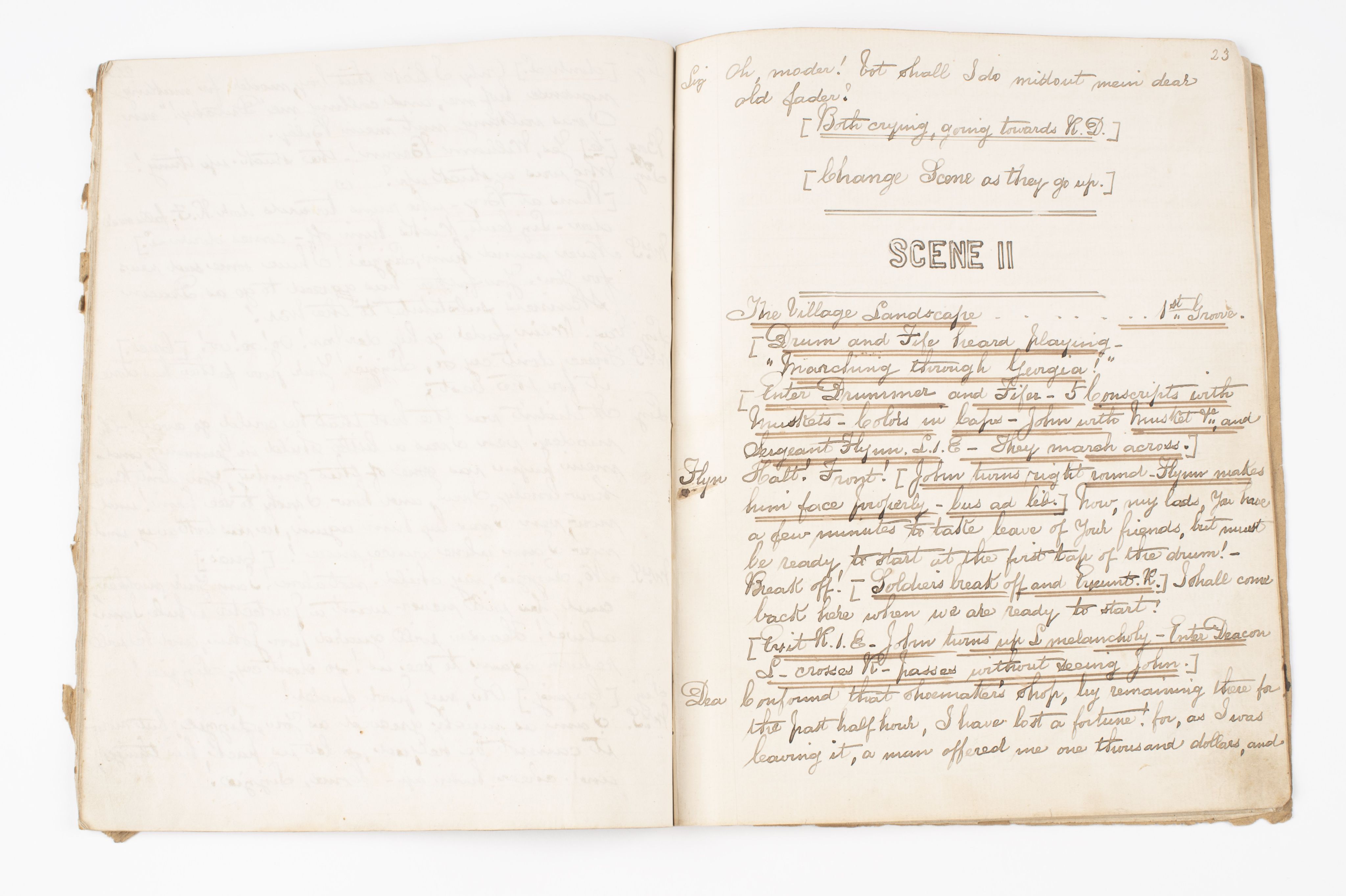 Open pages of script. Handwritten text on right page. 