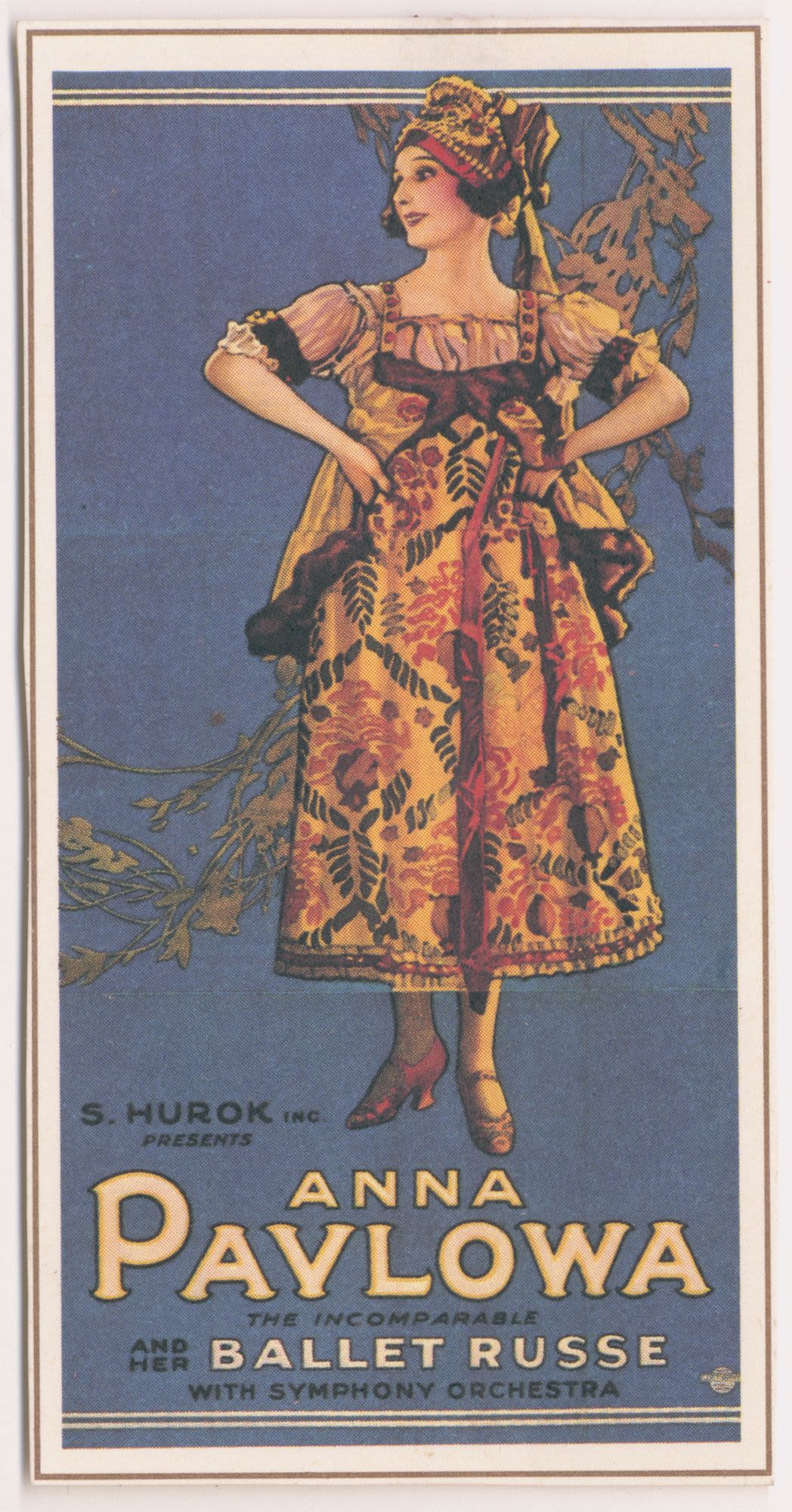 Blue card featuring an illustration of a woman. She is wearing a Russian style dance costume with a headdress. The dress is red, orange, black and green with flower embroidery. Her hands are on her hips and she is looking to the right. Block letter text on bottom of card. 