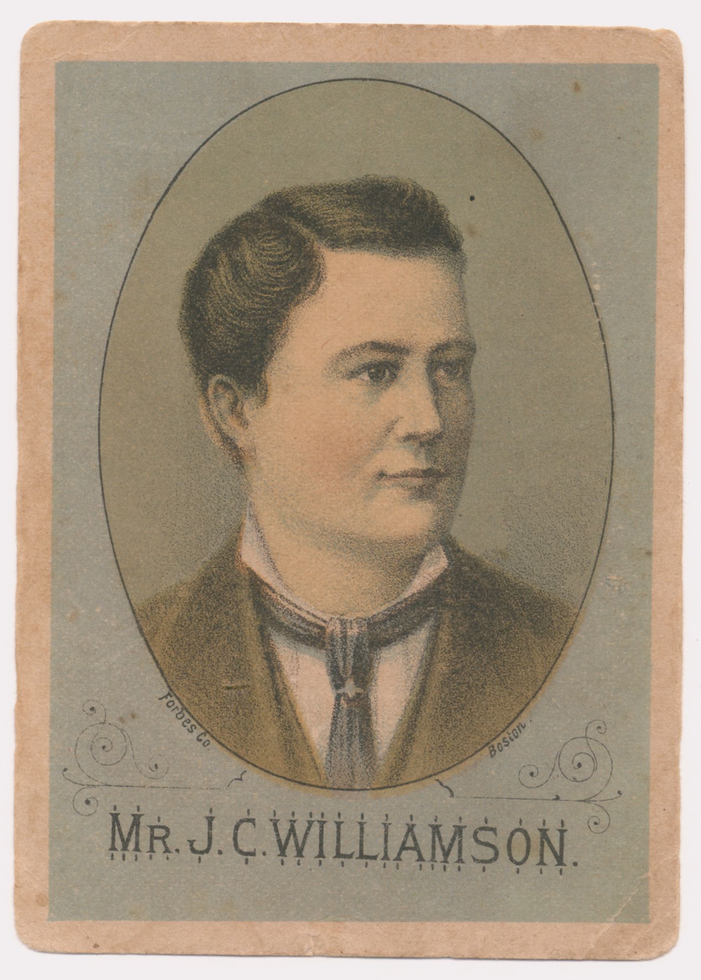 Illustration of a head and shoulders portrait of a man. He is wearing a suit, shirt and tie and his head is turned to the right. Portrait is framed in an oval window. 'Mr. J.C. Williamson' written below. 