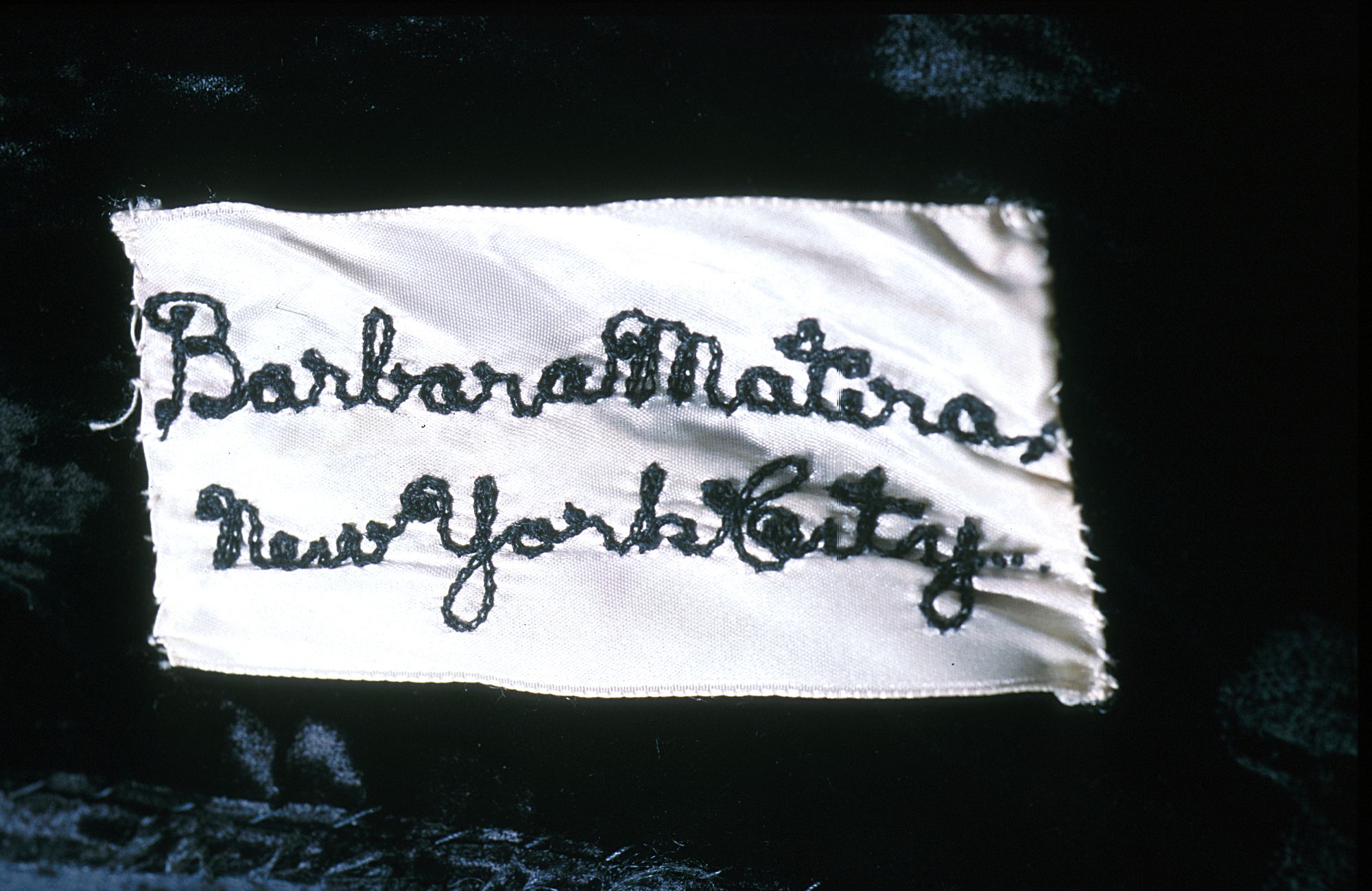 Label showing designers signature sewn into costume from Semiramide