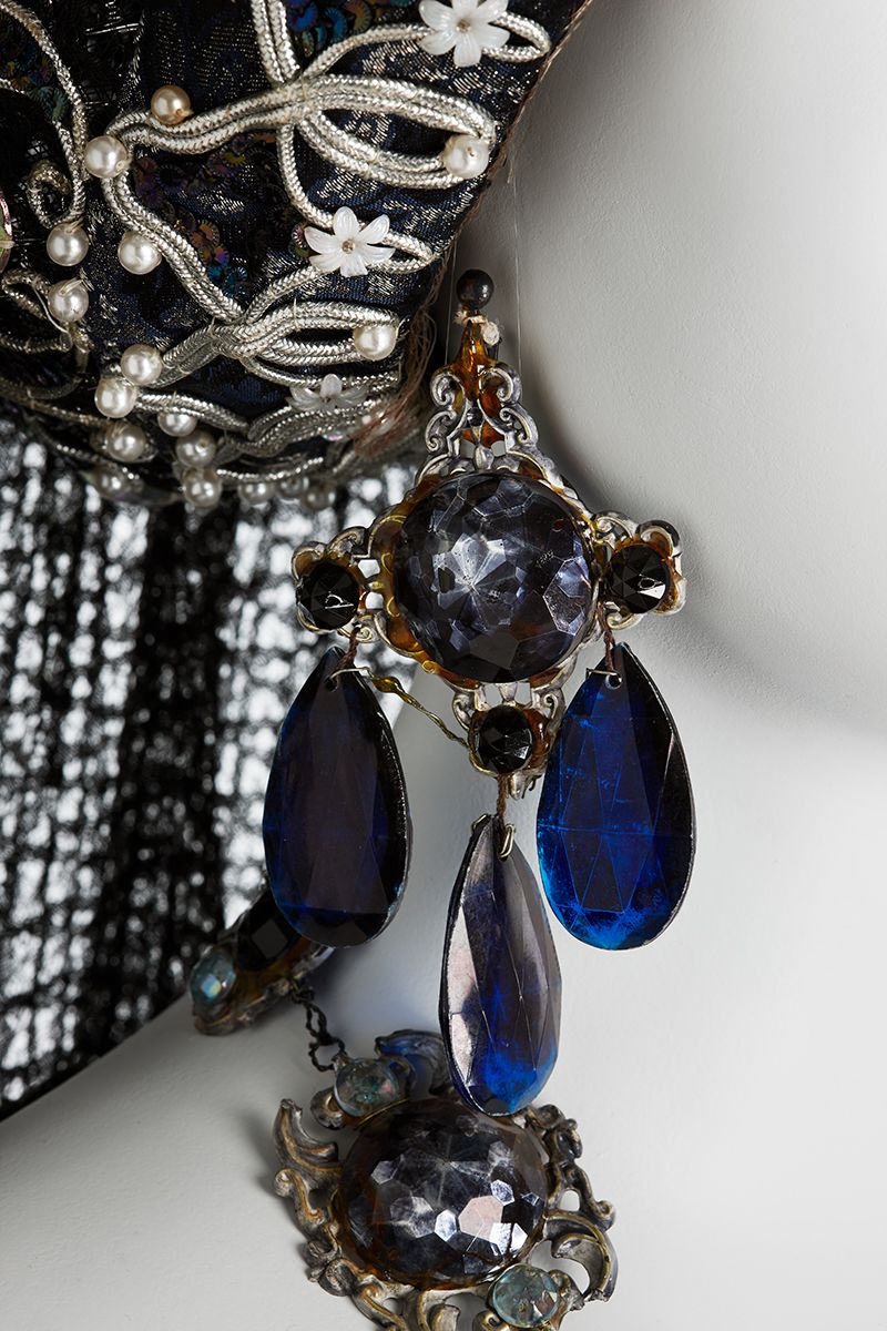 Detail of sleeve showing Detail showing blue glass earring as part of the costume worn by Joan Sutherland in Lucrezia Borgia.