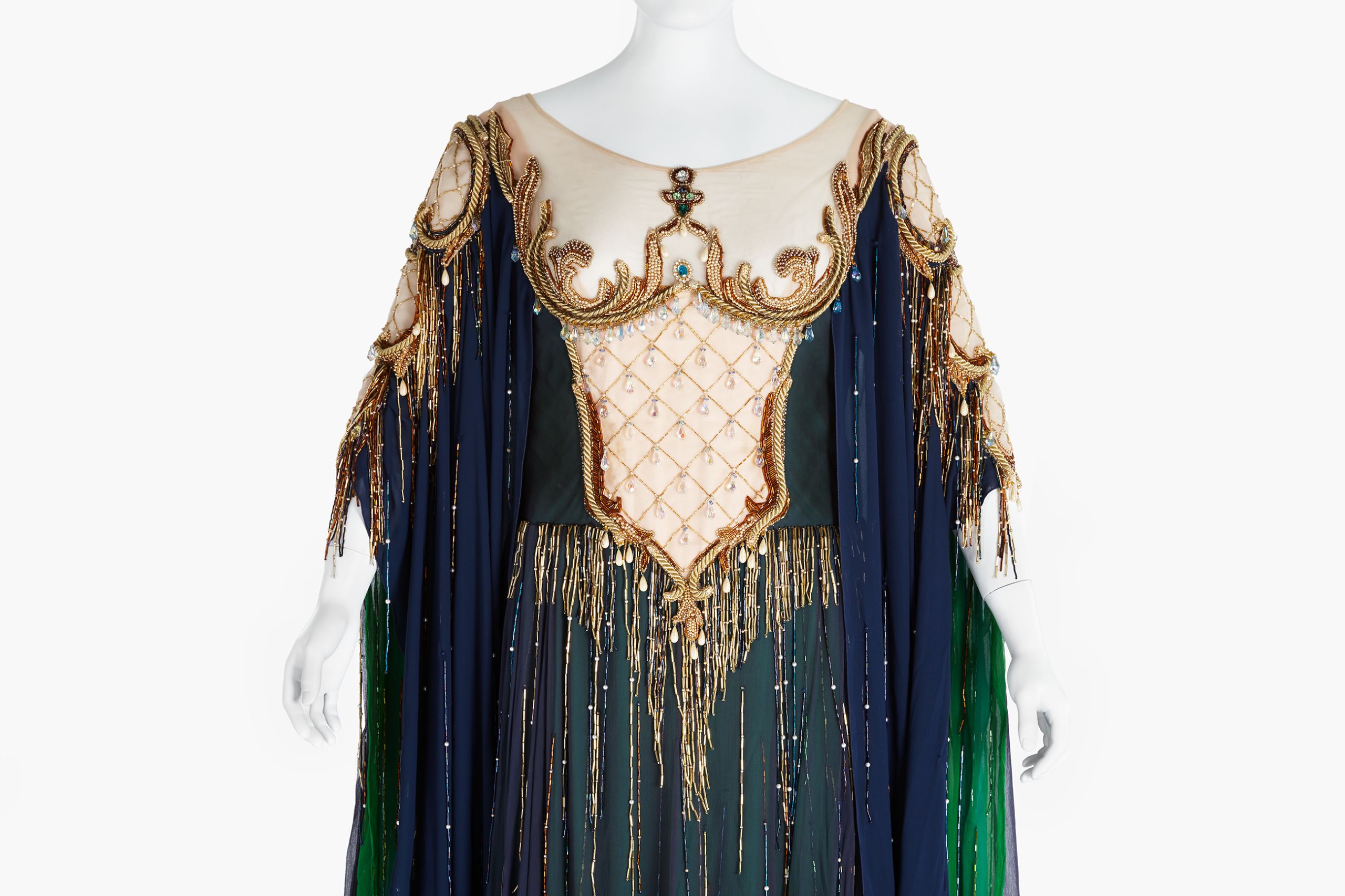 Detail of bodice of dress with gold trim and beading.
