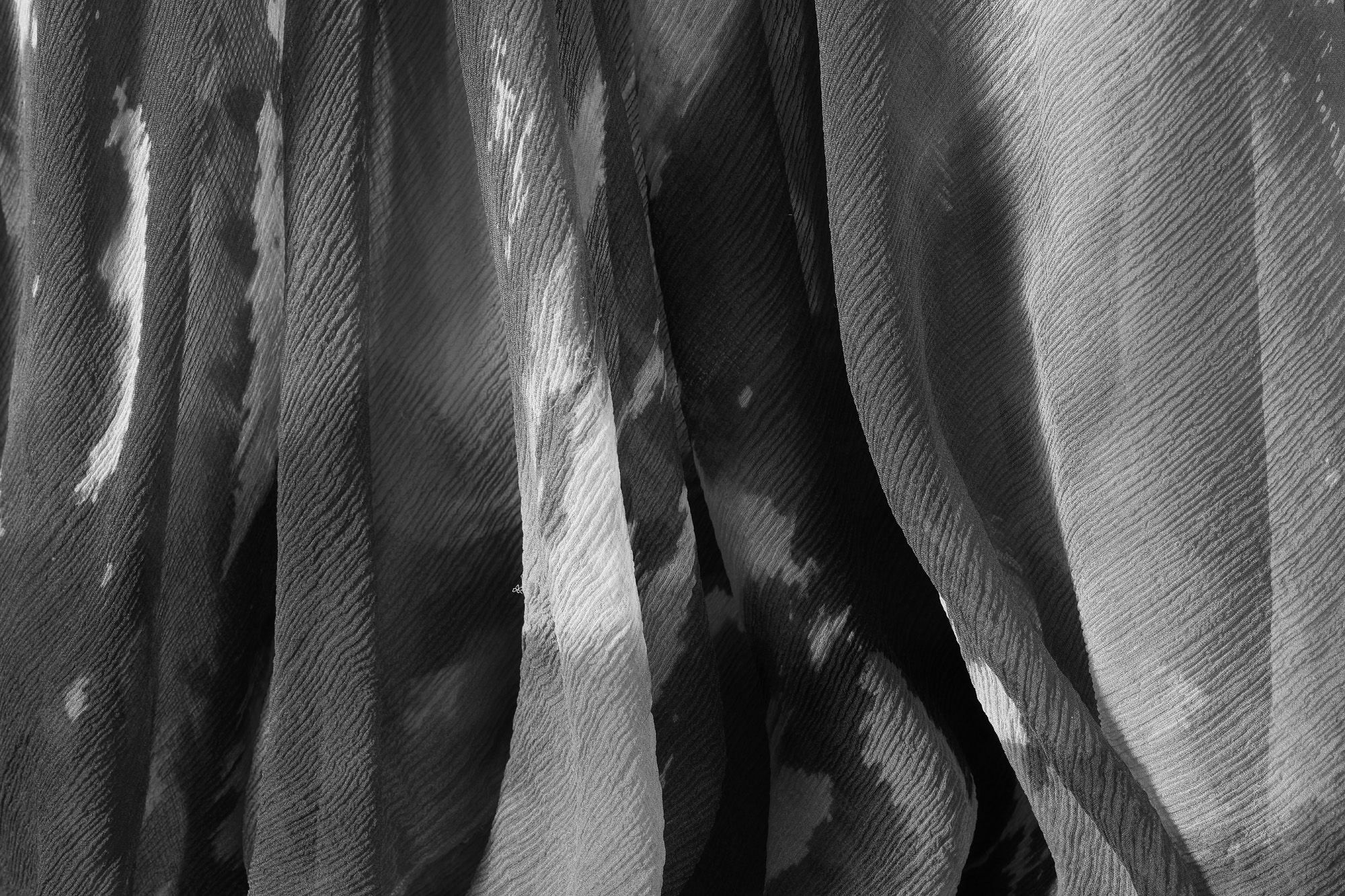 Close up of light draping fabric.