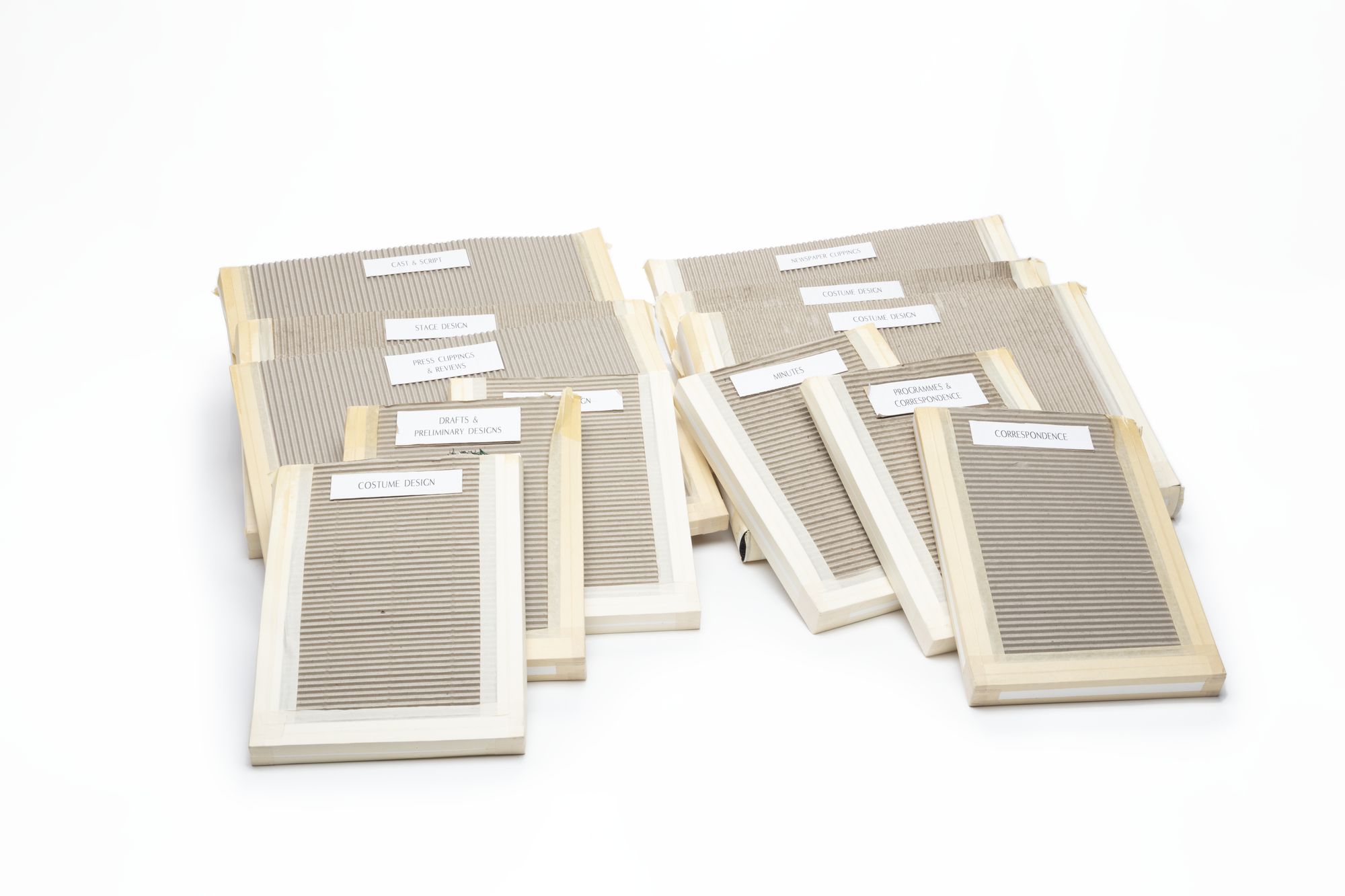 Various currogated cardboard folders with labels.