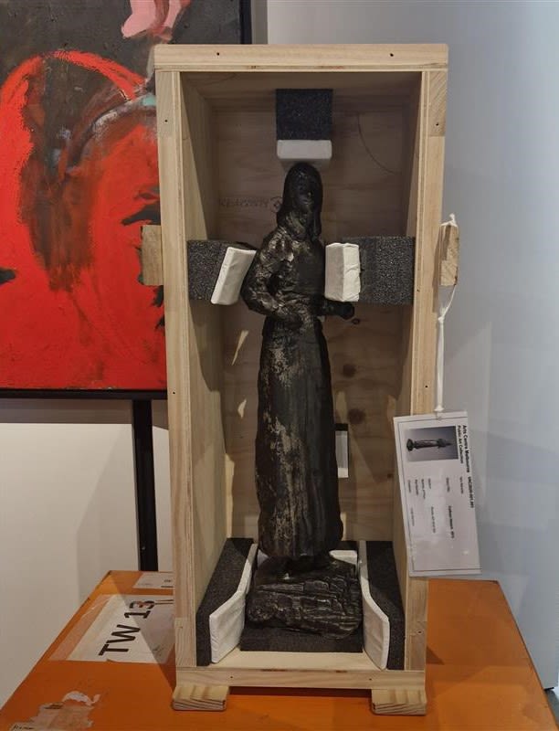 Photograph of a sculpture a crate.