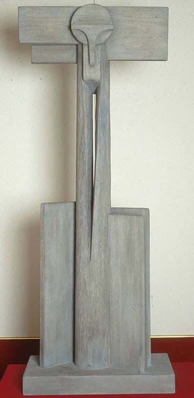 Photograph of a grey stone sculpture.