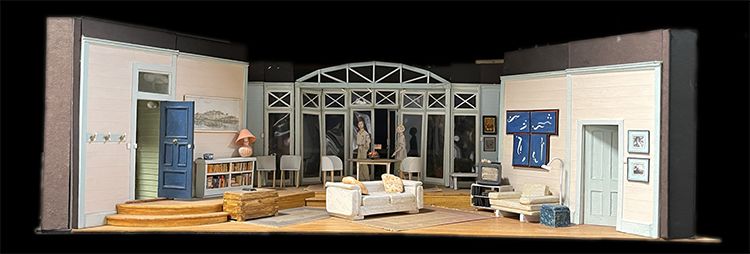 A set model showing the interior of a house in contemporary 1990s style