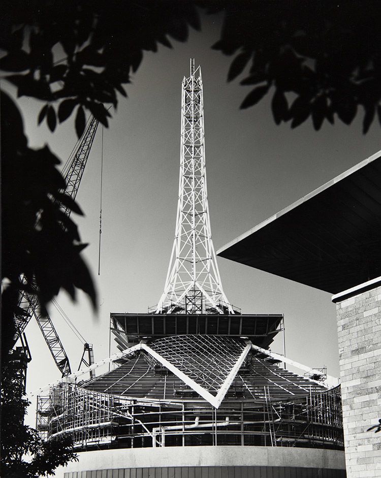 View of the building under construction with the Spire three quarters complete